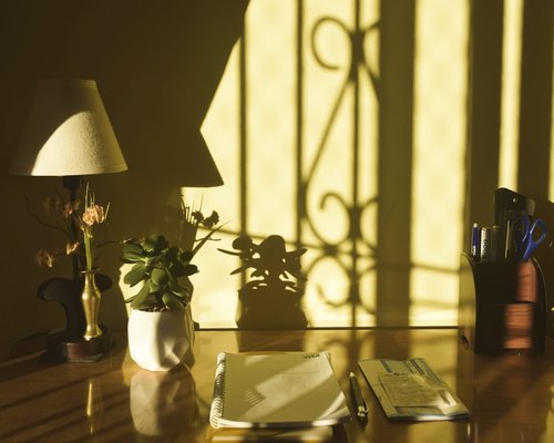 A well lit desk at home with natural light